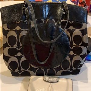 Two coach bags and a wallet.